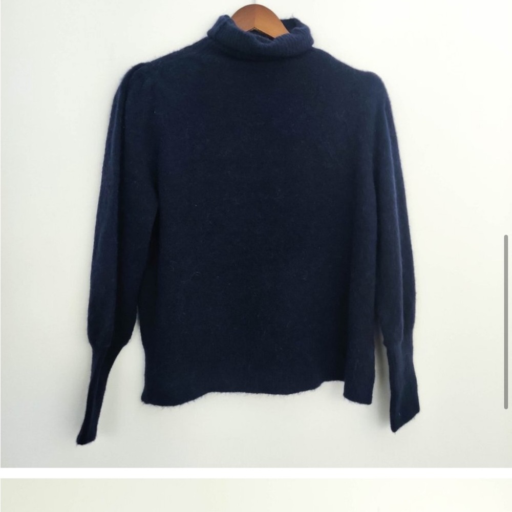 This is a gorgeous sweater. Frame